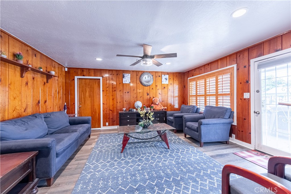 4759 Cochran Street Simi Valley, CA 93063 - Photo 10 of 71 a living room with furniture and a large window