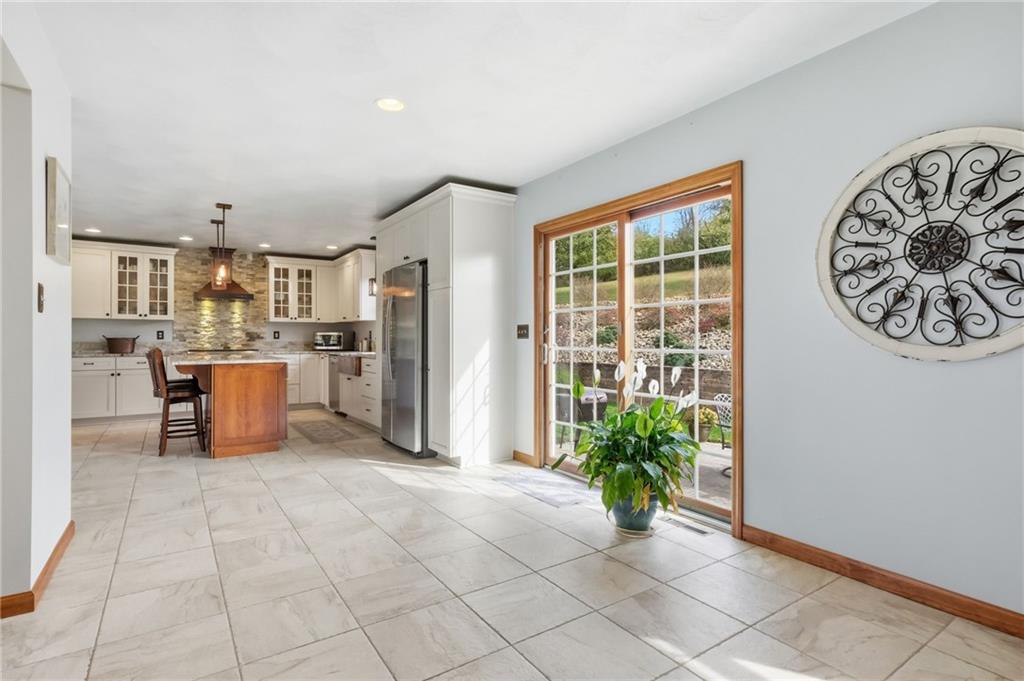 1146 Sarver Road Sarver, PA 16055 - Photo 11 of 50 a view of a kitchen with furniture and a potted plant