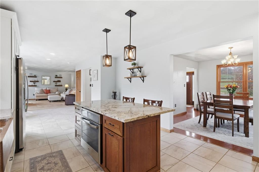 1146 Sarver Road Sarver, PA 16055 - Photo 17 of 50 a room with furniture a clock and a view of living room