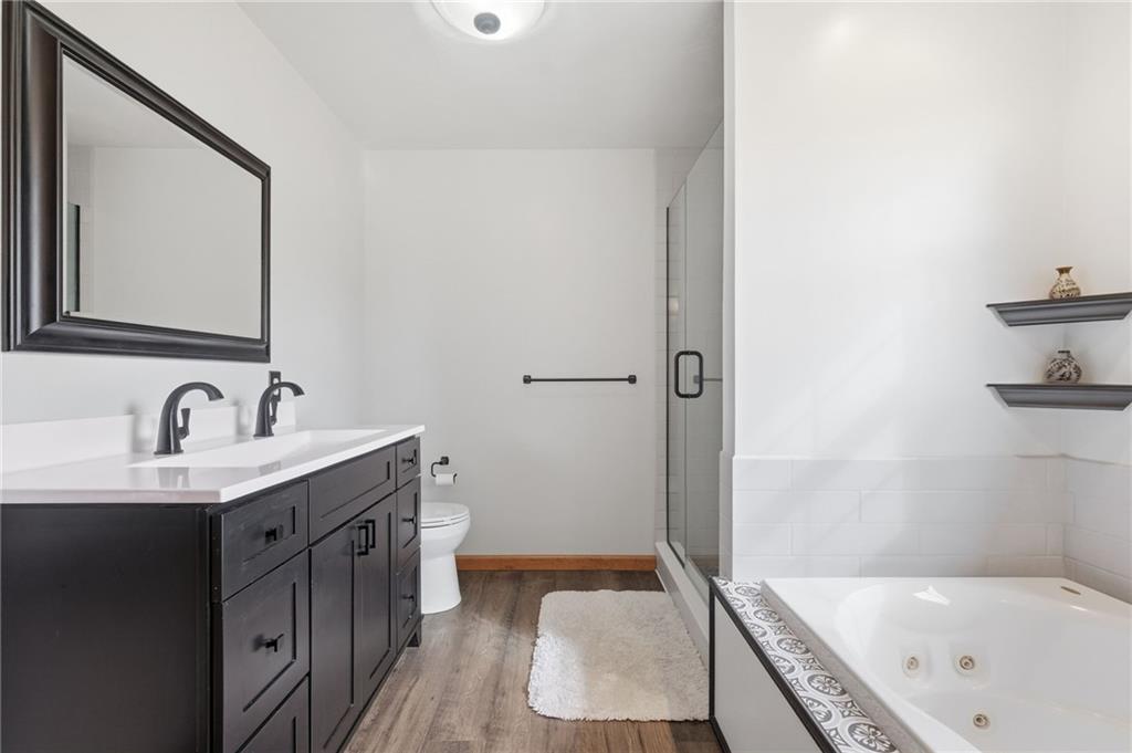 1146 Sarver Road Sarver, PA 16055 - Photo 28 of 50 a bathroom with a tub sink and mirror