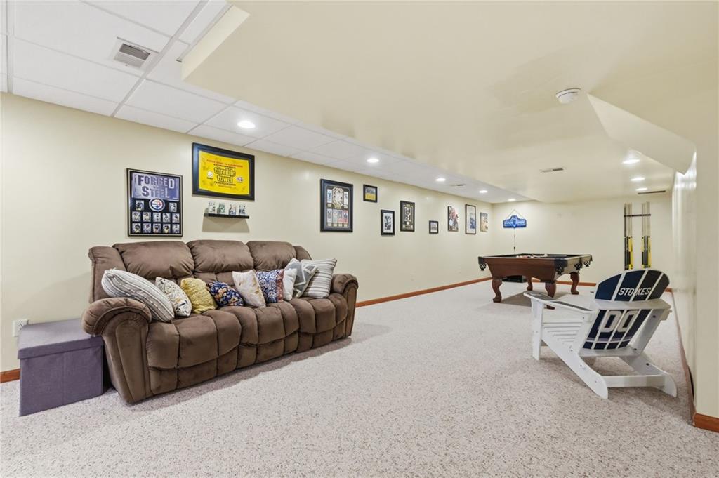 1146 Sarver Road Sarver, PA 16055 - Photo 38 of 50 a living room with furniture and a wall painting