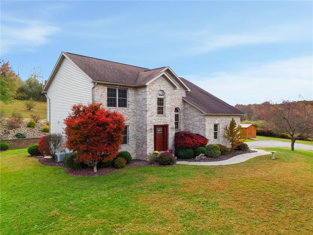 1146 Sarver Road Sarver, PA 16055 - Photo 4 of 50 a front view of house with yard and trees