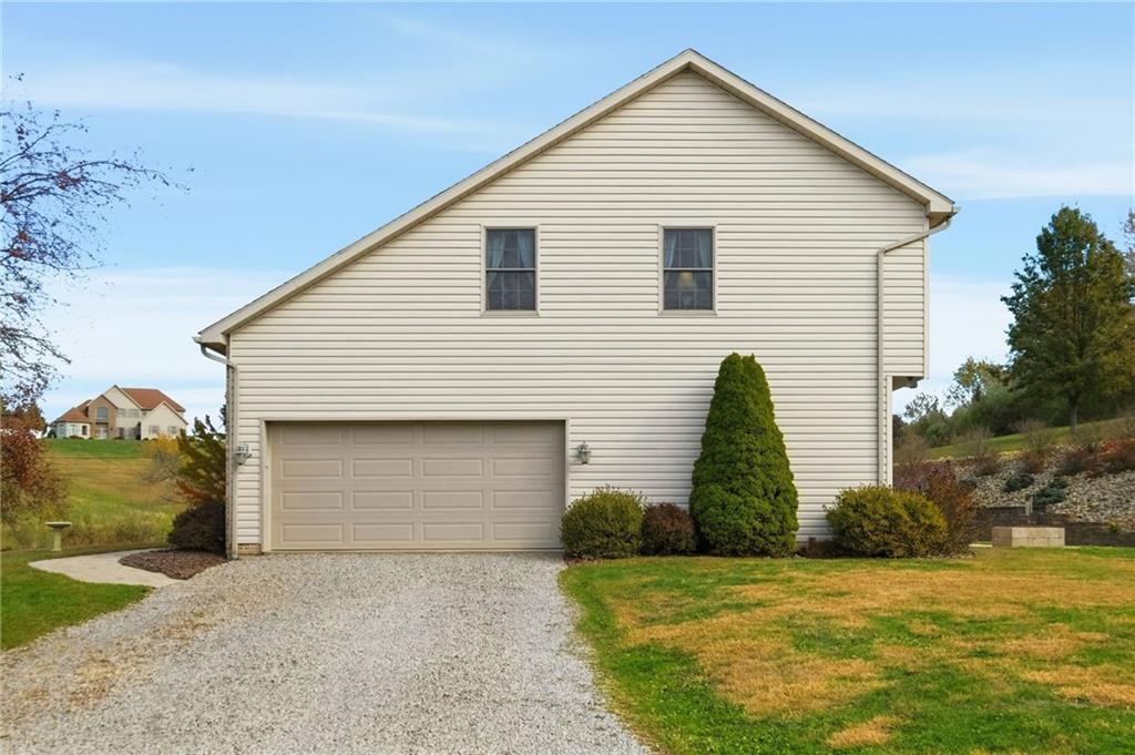 1146 Sarver Road Sarver, PA 16055 - Photo 42 of 50 a view of a house with a yard and garage
