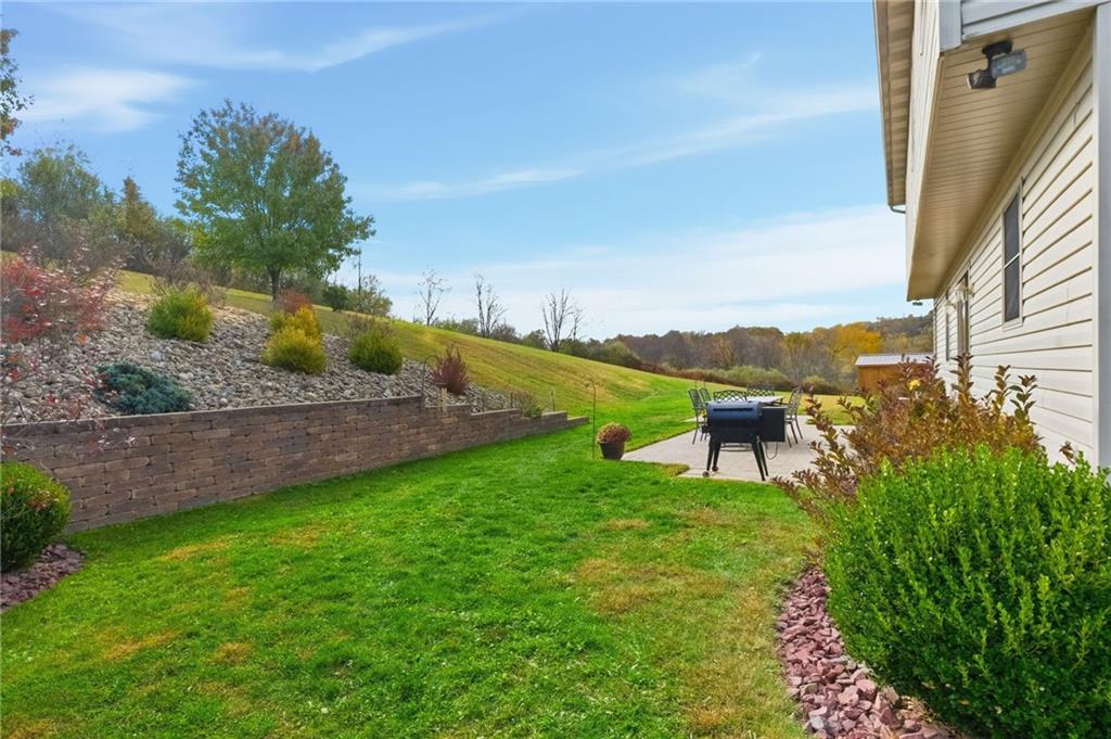 1146 Sarver Road Sarver, PA 16055 - Photo 46 of 50 a view of a garden with a building in the background