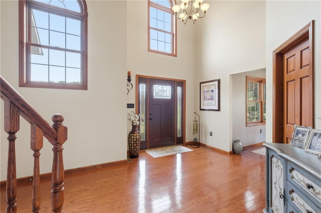 1146 Sarver Road Sarver, PA 16055 - Photo 6 of 50 a view of an empty room with window and hardwood floor