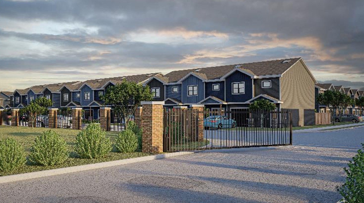 14010 Longstreet Road, Unit 14 Willis, TX 77318 - Photo 3 of 6 front view of a house with a yard
