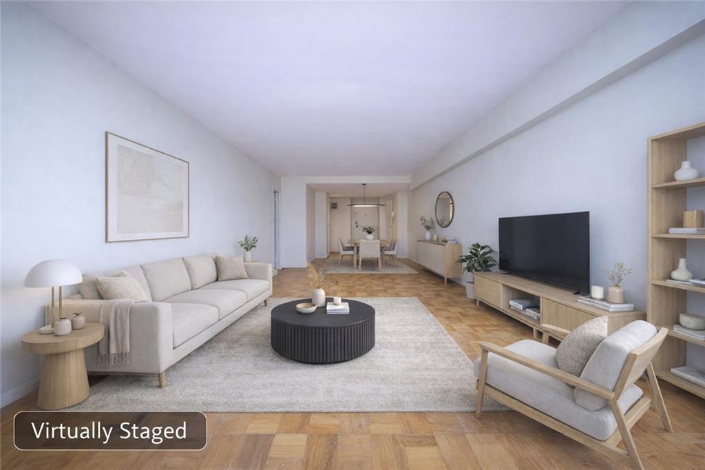 8901 Shore Road, Unit 7B Brooklyn, NY 11209 - Photo 5 of 12 a living room with furniture and a flat screen tv