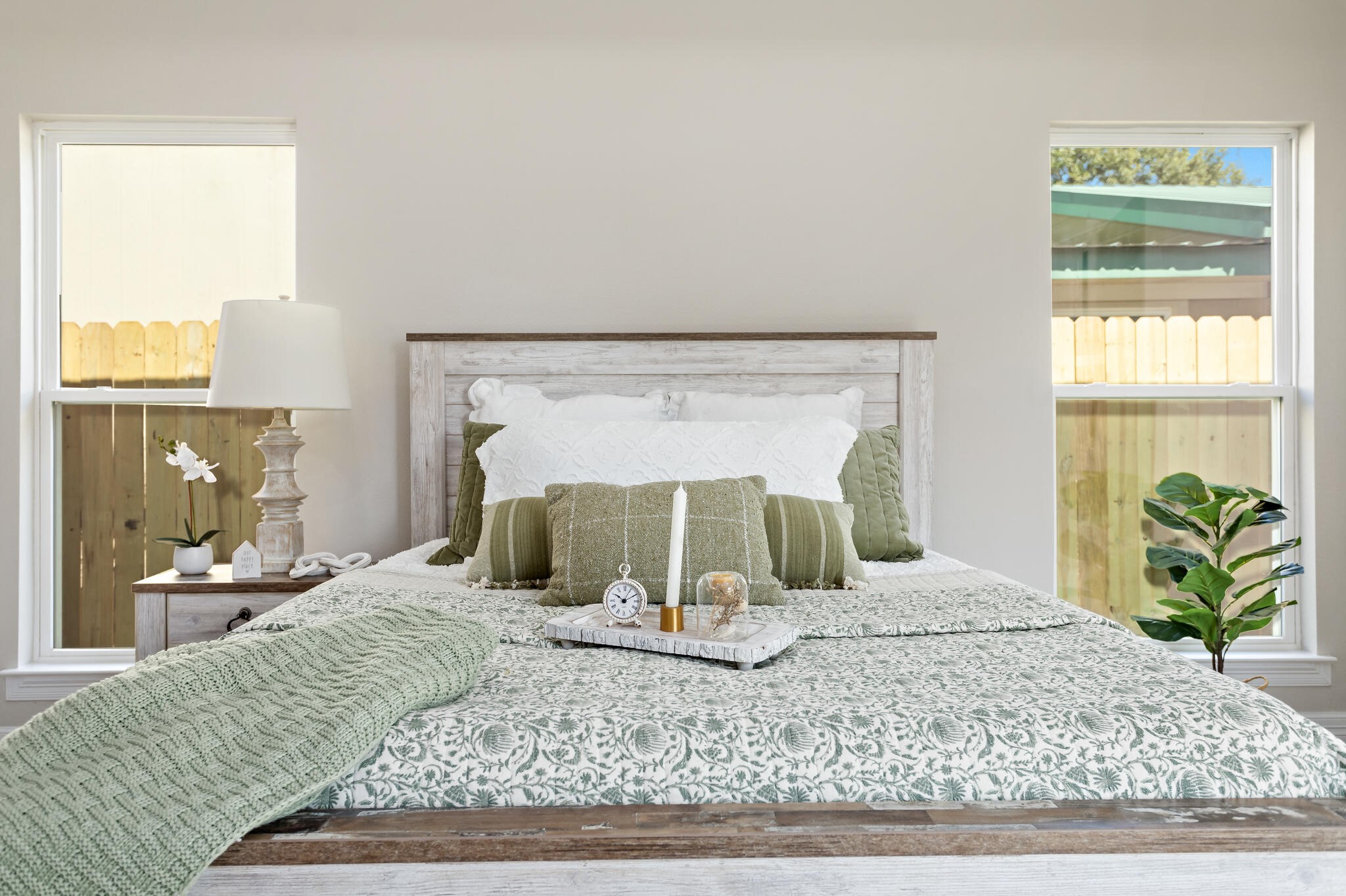 1813 Ordway Street Port Neches, TX 77651 - Photo 15 of 32 a bedroom with a large bed and a window