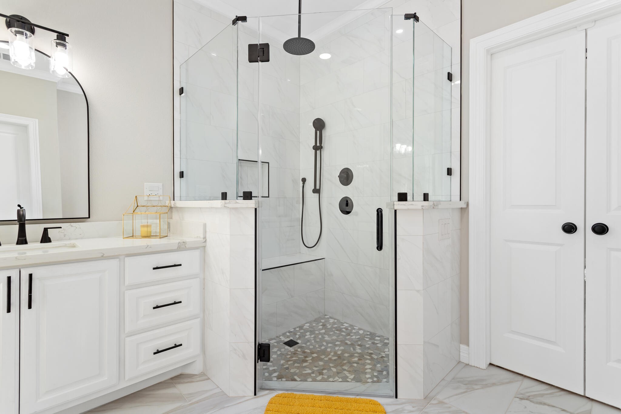 1813 Ordway Street Port Neches, TX 77651 - Photo 19 of 32 a bathroom with a granite countertop sink a shower a mirror and a bathtub