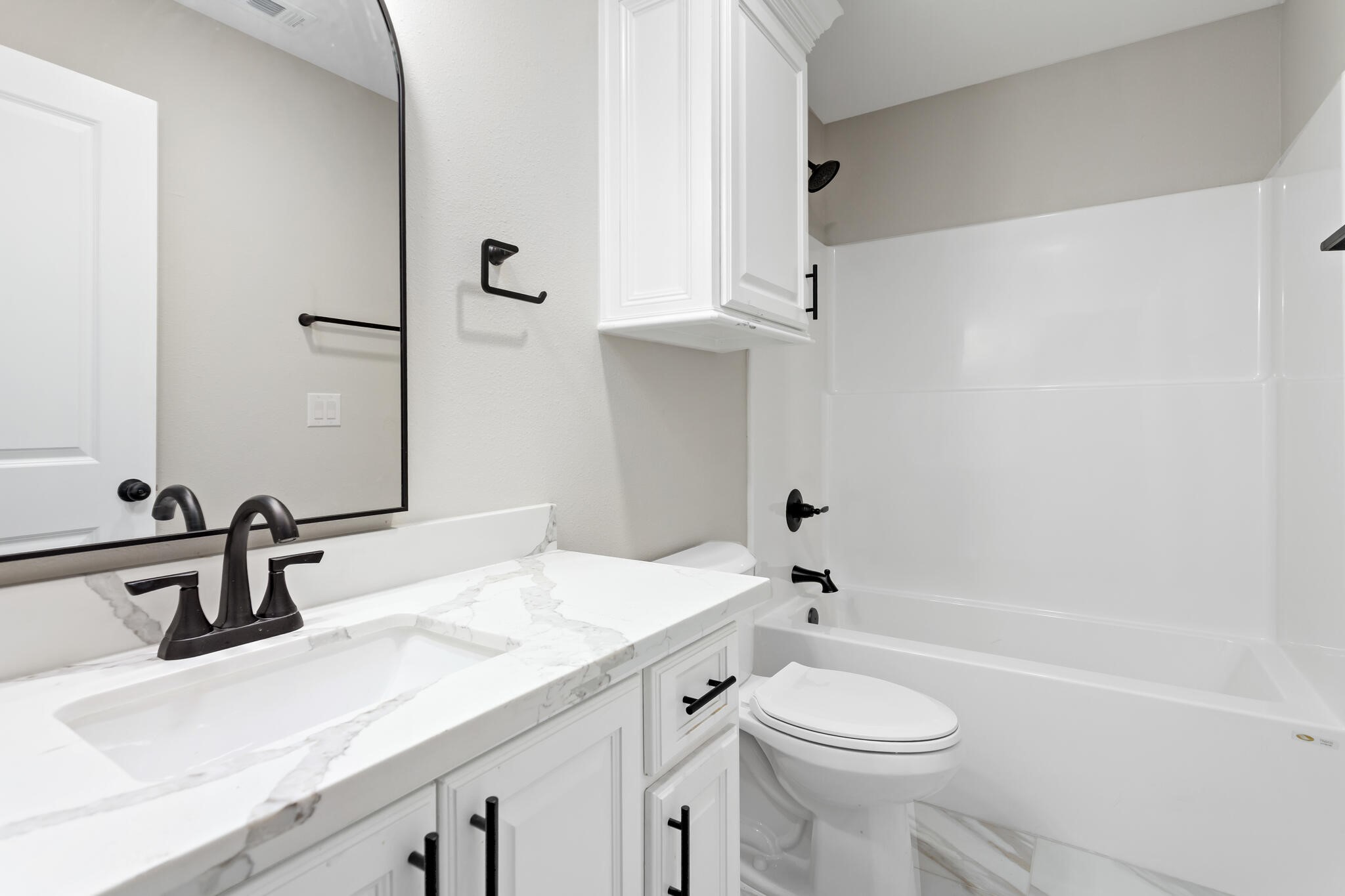 1813 Ordway Street Port Neches, TX 77651 - Photo 23 of 32 a bathroom with a sink a toilet and shower