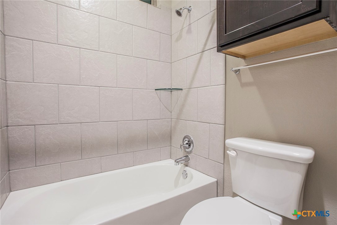 549 Wills Point Way Belton, TX 76513 - Photo 25 of 31 a bathroom with a toilet and bathtub