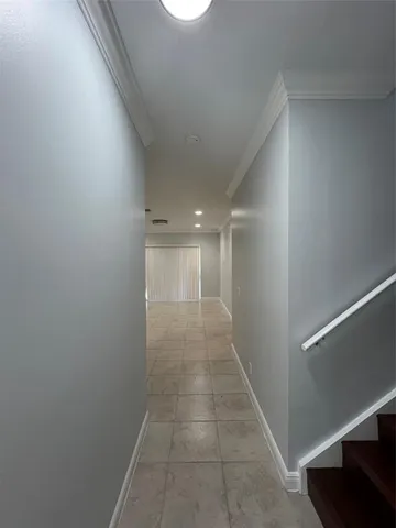 a view of hallway with a window