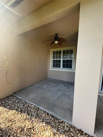 a view of a porch with a yard