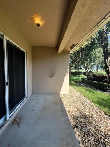 a bathroom with a mirror sink and vanity