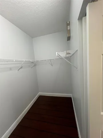 a view of small space with racks on the wall