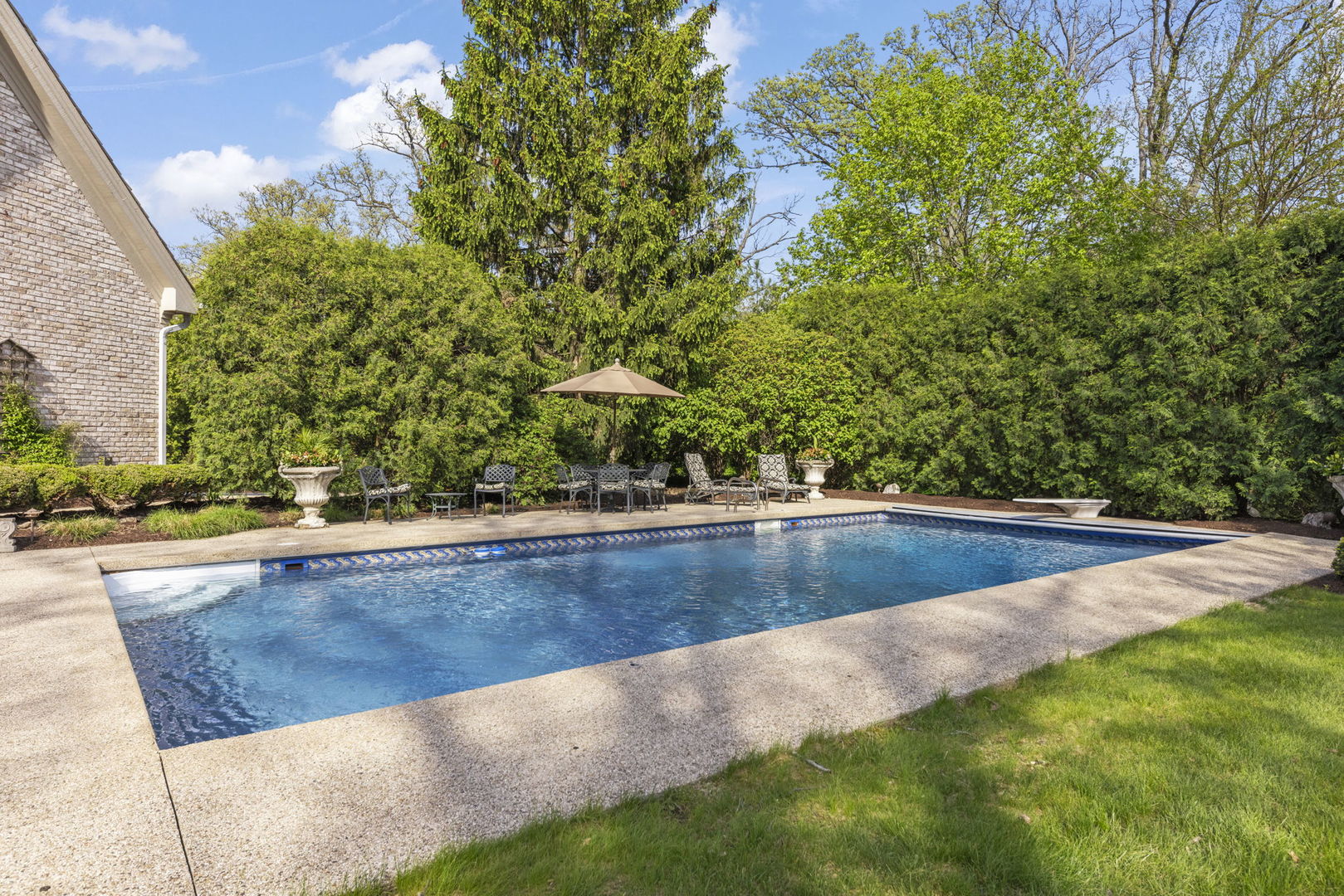 1S151 Winfield Road Wheaton, IL 60189 - Photo 58 of 73 a view of a swimming pool with an outdoor space