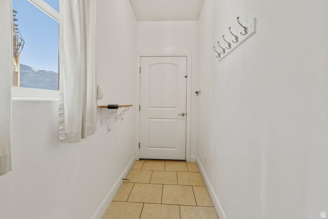 1001 Pine Valley Road Pine Valley, UT 84781 - Photo 30 of 49 Hall featuring light tile patterned flooring and baseboards