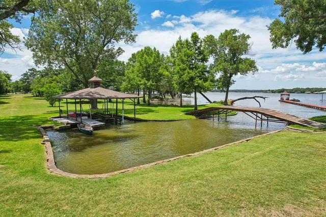 a view of a swimming pool with a garden