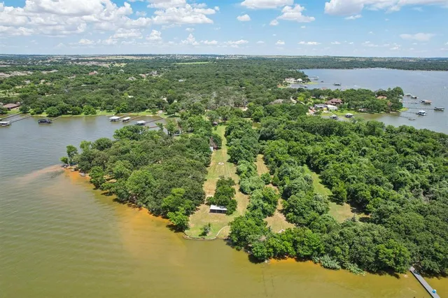 a view of a lake with a building in the background