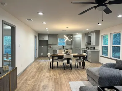 a view of a dining room with furniture