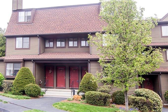 115 Fillow Street, Unit 4 Norwalk, CT 06850 - Photo 1 of 1 a front view of a house with garden