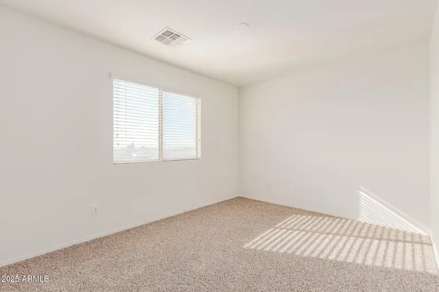 a bathroom with a sink a toilet a shower and a mirror