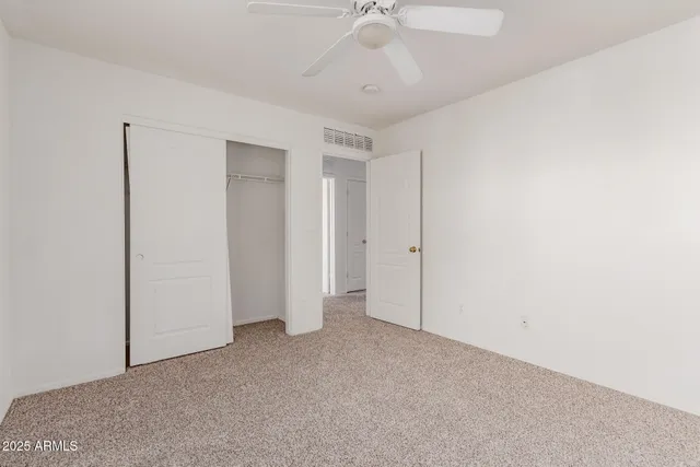 a room with a table and chairs