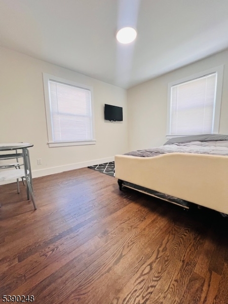 275 Valley Road Clark, NJ 07066 - Photo 7 of 14 a view of a room with wooden floor and window