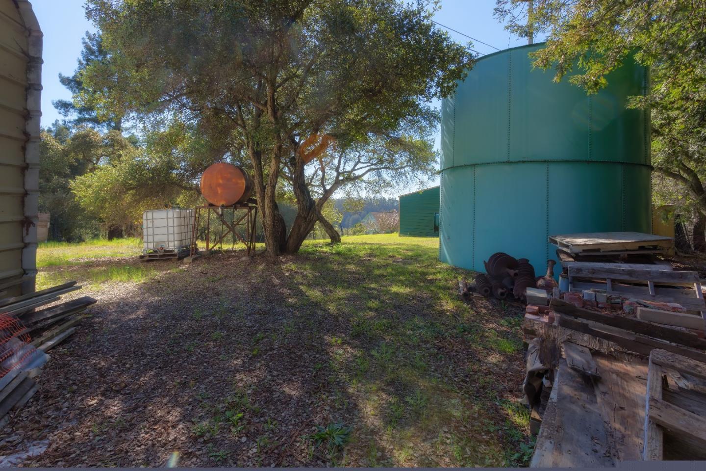 875 Calabasas Road Watsonville, CA 95076 - Photo 17 of 34 a backyard of a house with lots of green space