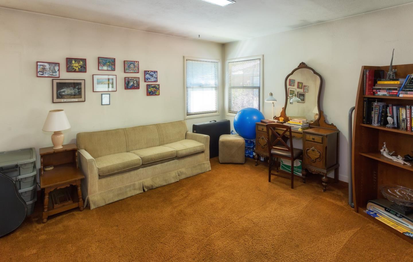 875 Calabasas Road Watsonville, CA 95076 - Photo 28 of 34 a living room with furniture and a window