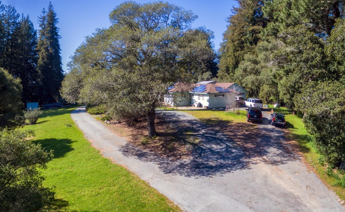 875 Calabasas Road Watsonville, CA 95076 - Photo 3 of 34 a view of a swimming pool with a yard