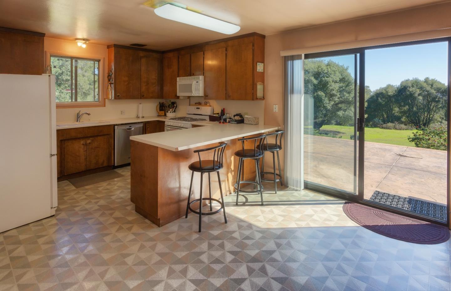 875 Calabasas Road Watsonville, CA 95076 - Photo 33 of 34 a view of a kitchen with a sink and cabinets