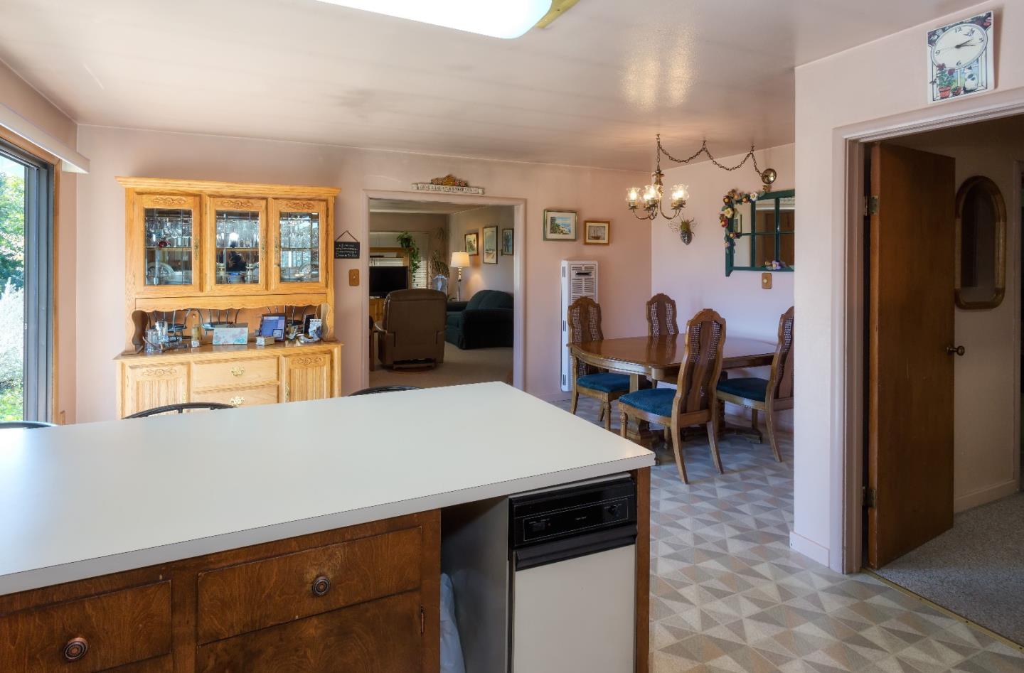 875 Calabasas Road Watsonville, CA 95076 - Photo 34 of 34 a view of a dining room with furniture and chandelier