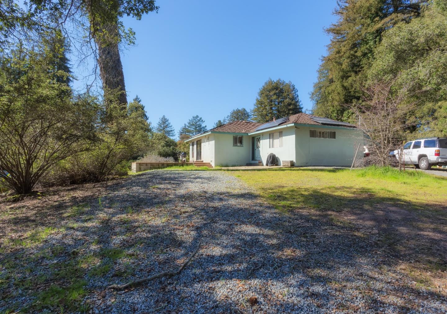 875 Calabasas Road Watsonville, CA 95076 - Photo 8 of 34 a front view of house with yard and trees