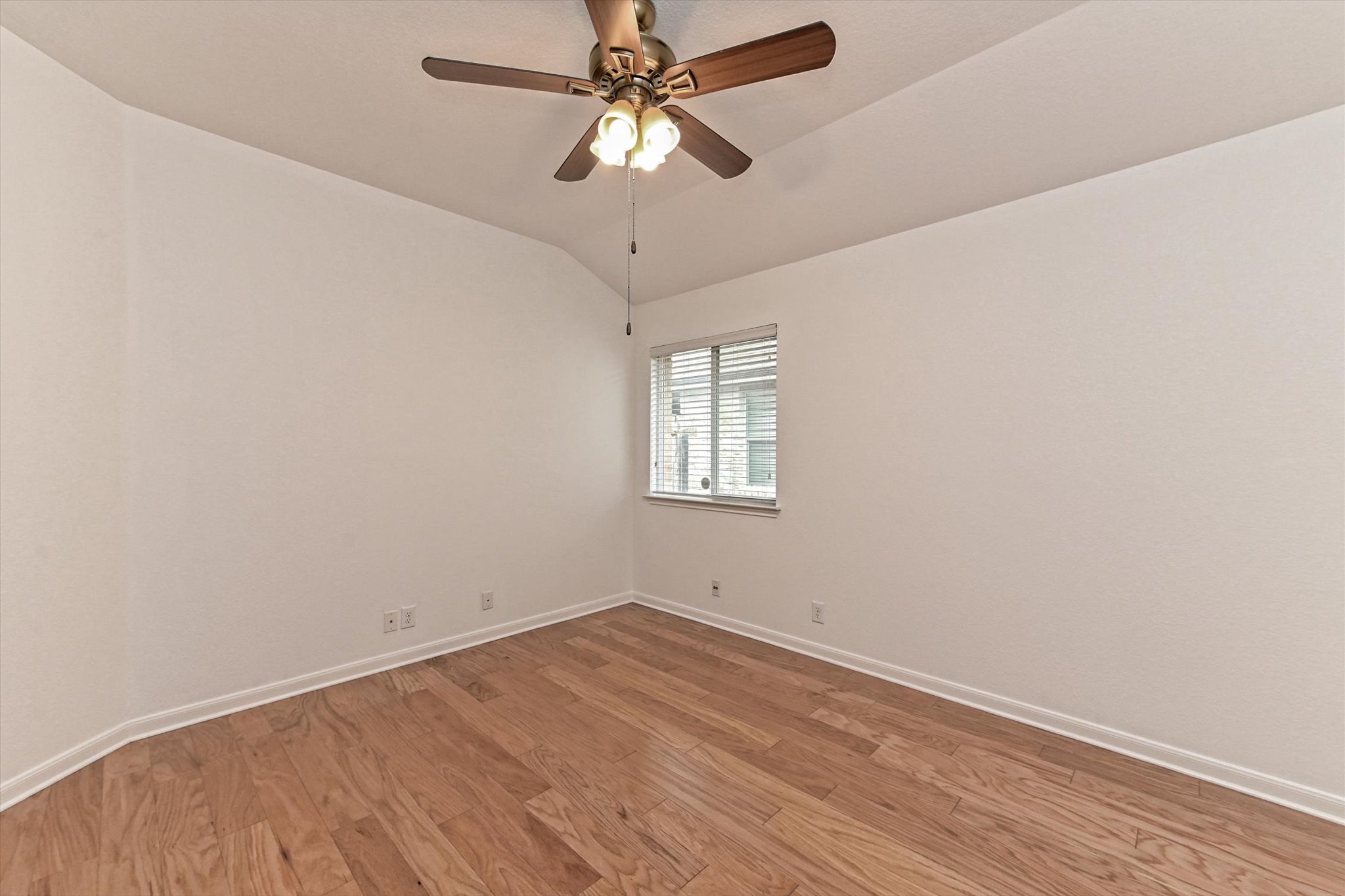 1921 Conn Creek Road Cedar Park, TX 78613 - Photo 11 of 40 an empty room with a window and a fan