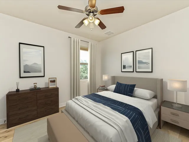 a bedroom with a bed and a mirror