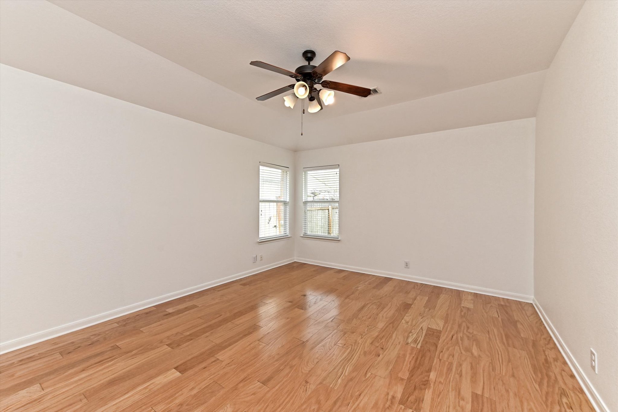 1921 Conn Creek Road Cedar Park, TX 78613 - Photo 19 of 40 wooden floor in an empty room with a window