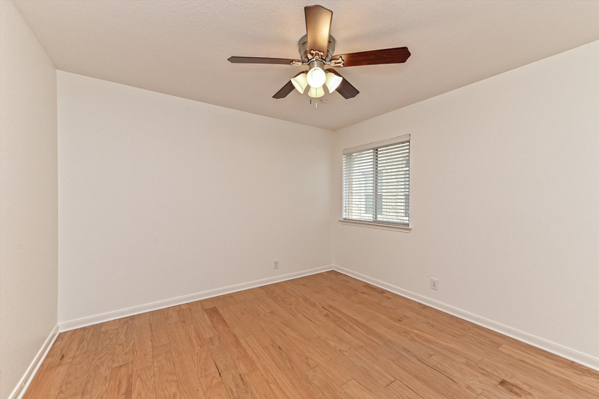 1921 Conn Creek Road Cedar Park, TX 78613 - Photo 26 of 40 wooden floor in an empty room with a window
