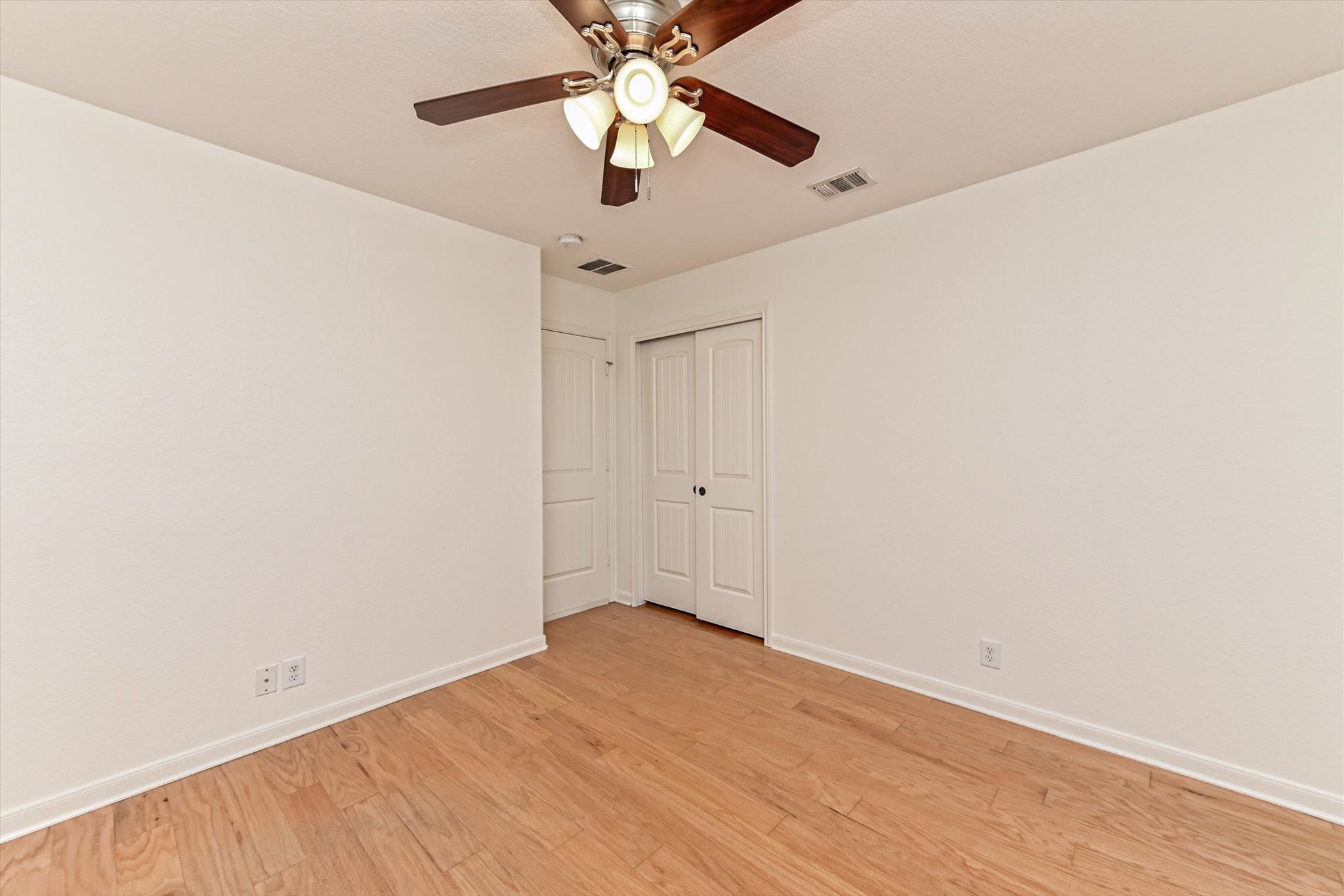 1921 Conn Creek Road Cedar Park, TX 78613 - Photo 28 of 40 an empty room with a ceiling fan and a window