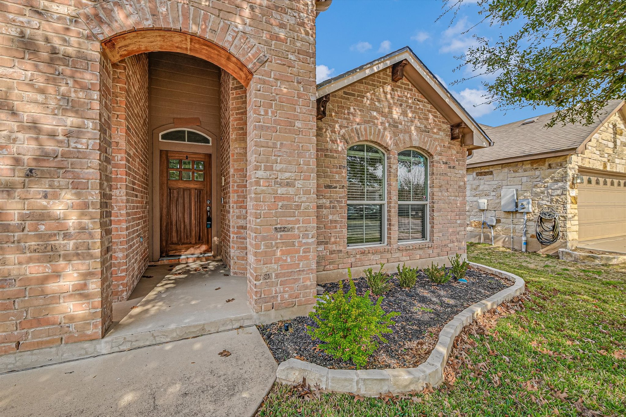 1921 Conn Creek Road Cedar Park, TX 78613 - Photo 3 of 40 a front view of a house with garden