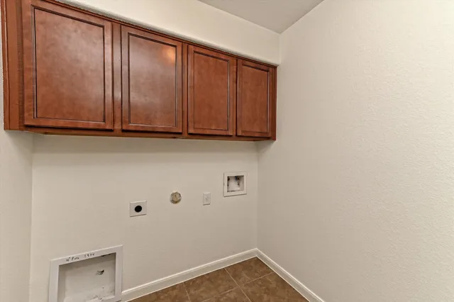 a view of storage and utility room with empty racks