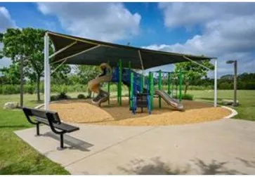 a view of swimming pool with backyard