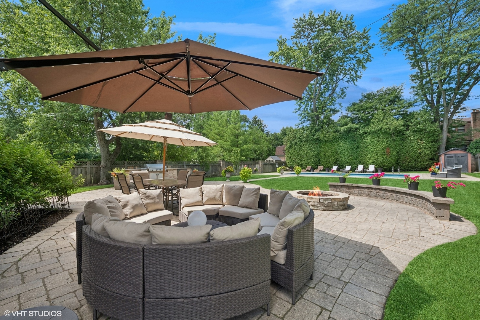700 Greenwood Road Northbrook, IL 60062 - Photo 61 of 81 a view of a patio with a table and chairs under an umbrella