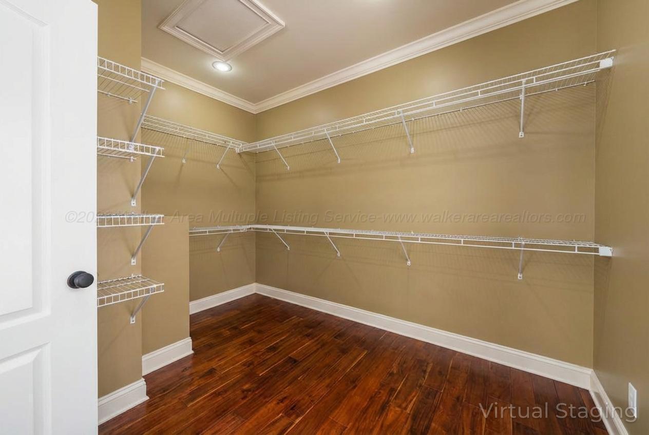 392 Baughn Road Jasper, AL 35503 - Photo 23 of 40 One of the many large walk-in closets in this home.
