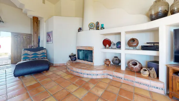 a bedroom with furniture and a chair