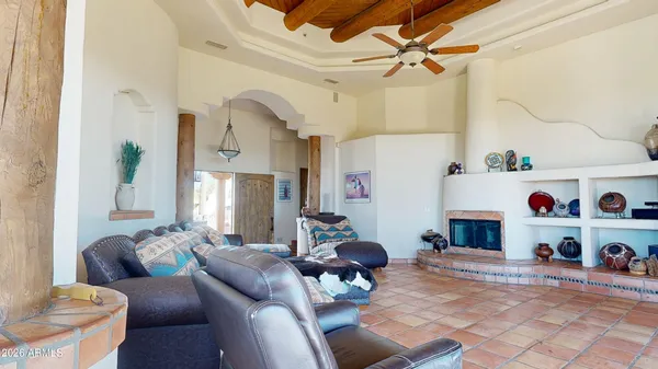 a living room with furniture and a rug