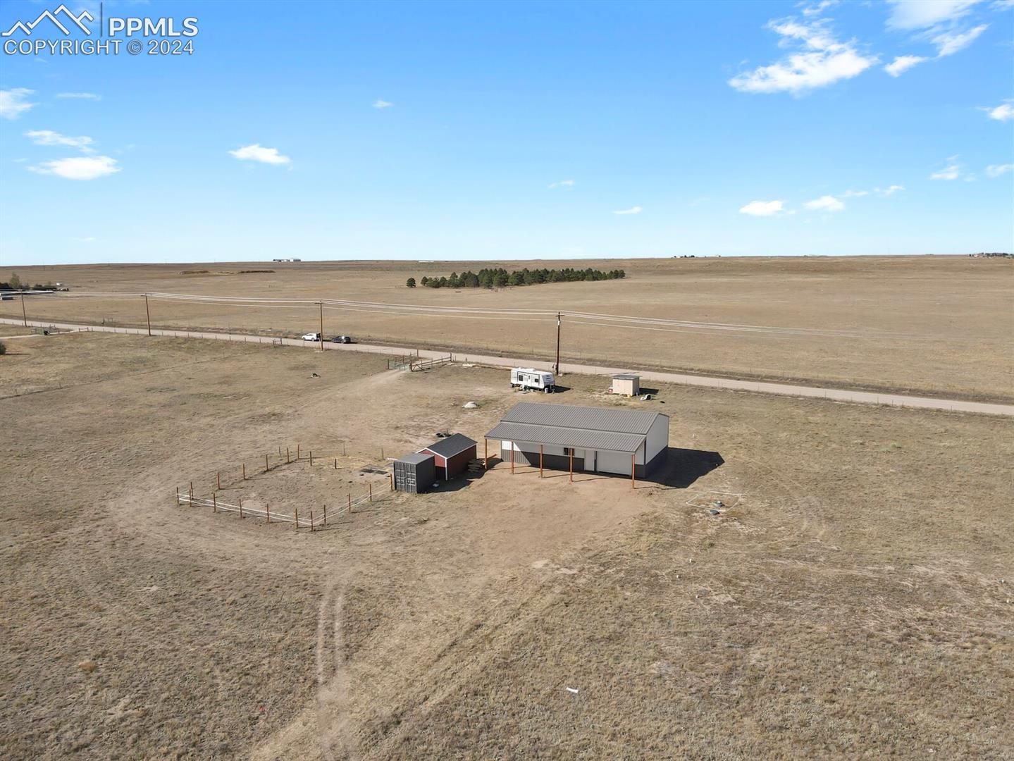 12155 Oil Well Road Calhan, CO 80808 - Photo 21 of 28 Seasonal dry creek bed running through the acreage