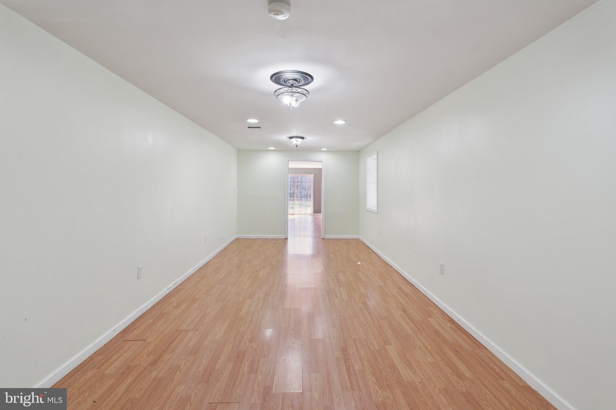 6169 Vance Lane Culpeper, VA 22701 - Photo 28 of 44 a view of empty room with wooden floor