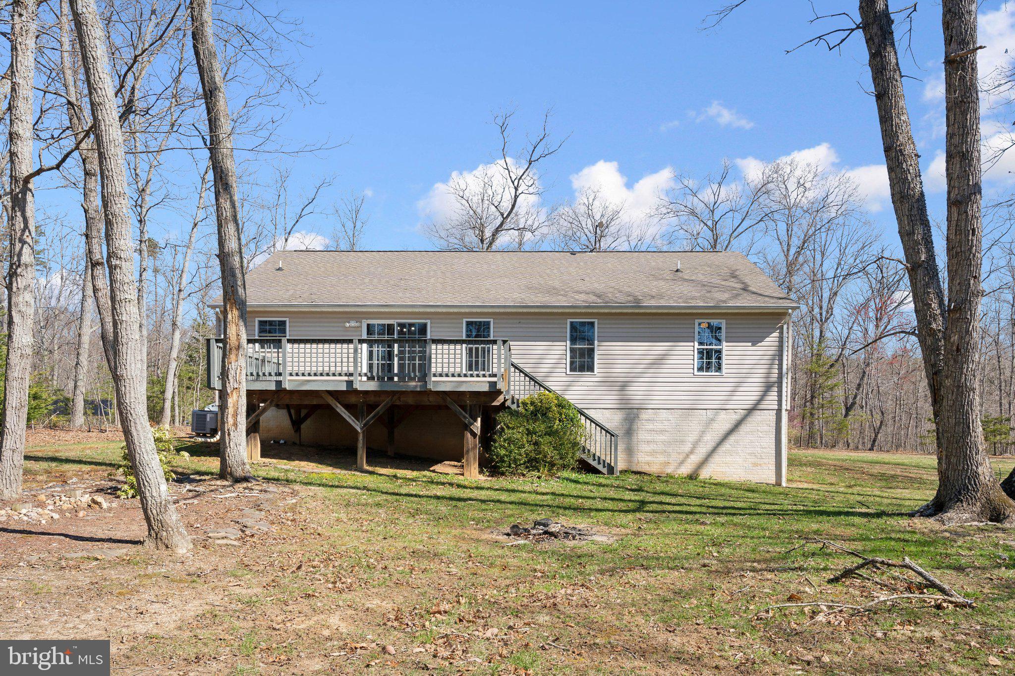 6169 Vance Lane Culpeper, VA 22701 - Photo 35 of 44 a view of a house with a yard