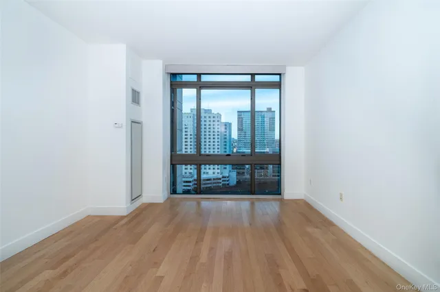 a view of a city with tall buildings